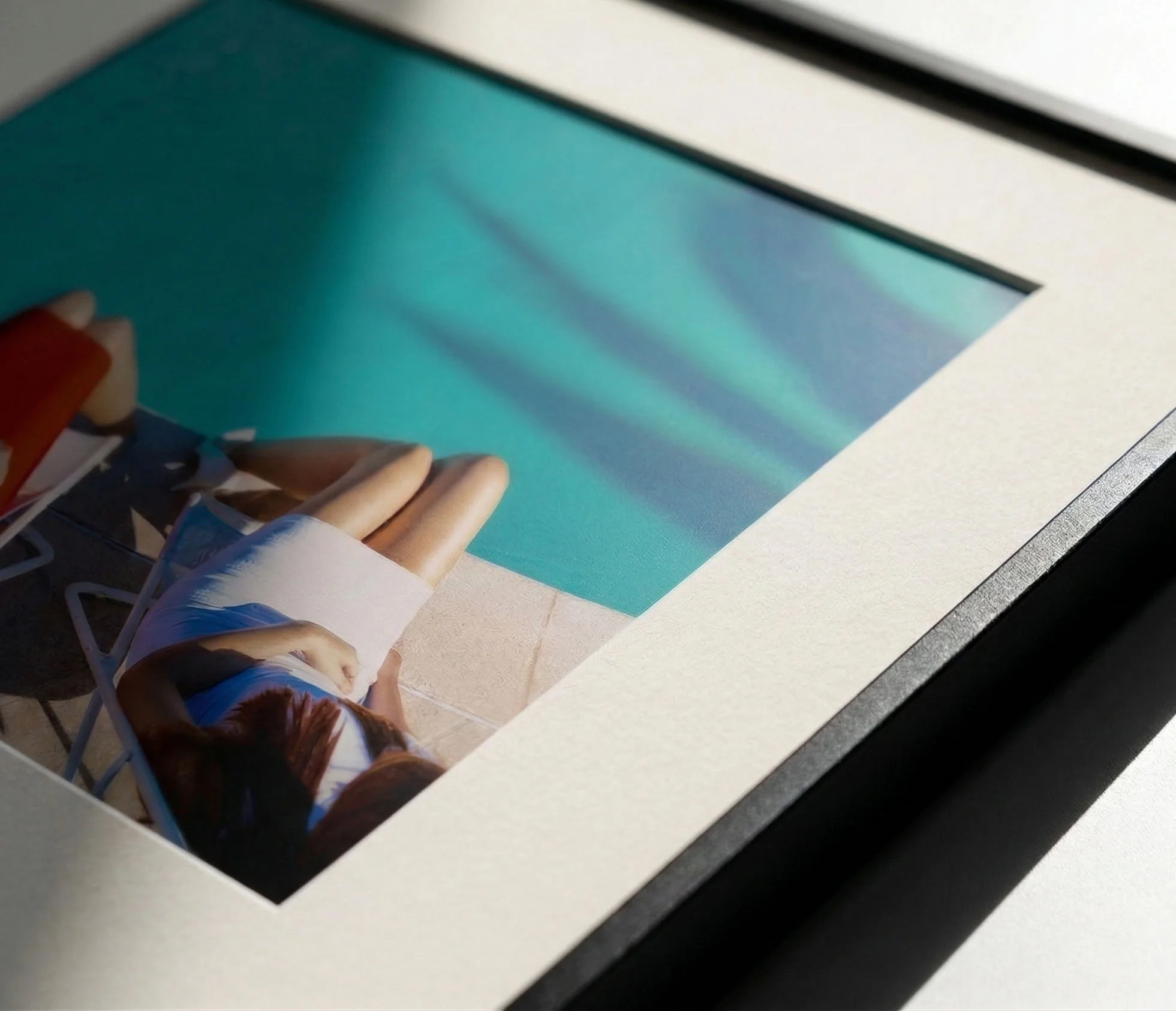 A close look at a framed photograph’s finish